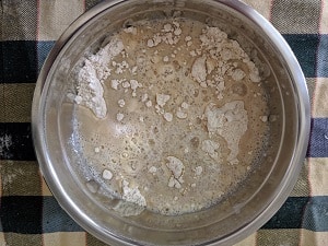 mixing the yeast and flour