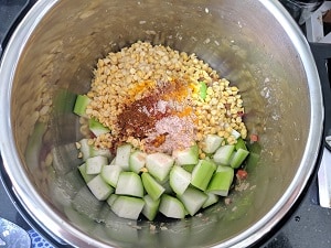 diced lauki, soaked chana dal and spices
