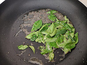 Curry Leaves crackling with mustard and sesame oil