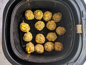 Broccoli bites placed in air fryer basket
