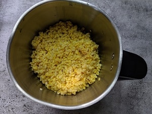 Soaked and drained moong dal added to a blender jar