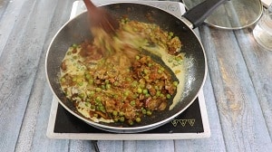 cashew cream added to the mushroom and peas curry