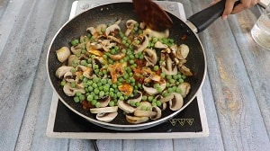mushroom and peas added with onion and tomato gravy base