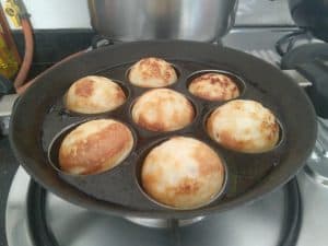Crunchy and soft Urad dal vadas in appe pan