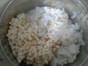 Rice, Coconut, poha and urad dal with methi seeds to be ground for Jackfruit Seed Surnoli