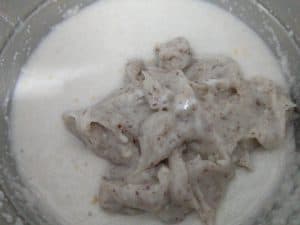 Mixing of the Jackfruit seed paste and rice batter.