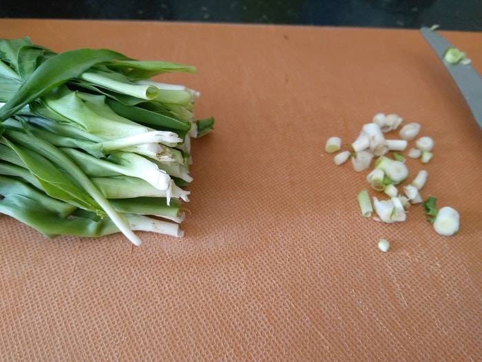Finely chopping the Phodshi Bhaji
