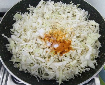 Cabbage cooked with turmeric and salt