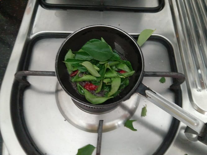 Tempering with curry leaves