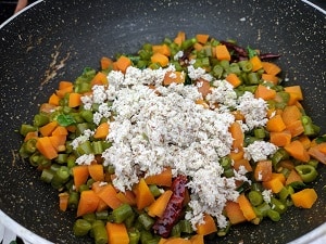 Coconut mix to the vegetables