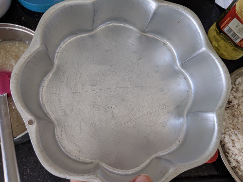 Greasing the cake tin