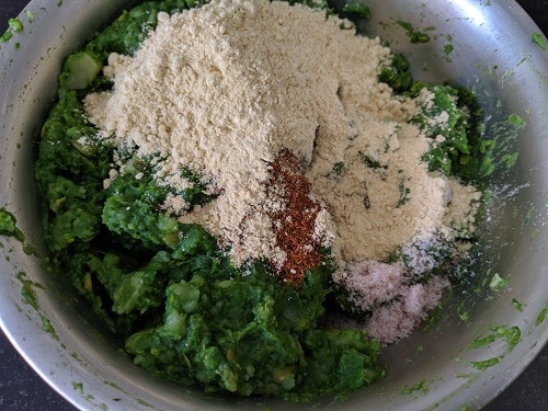 Adding gram flour to the potatoes