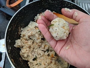 Shaping the Kozhukattai when warm