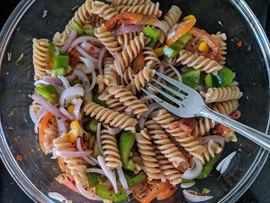 Mixing the salad with dressing