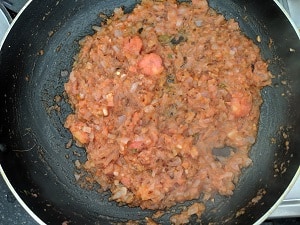Cooking the onion tomato mix