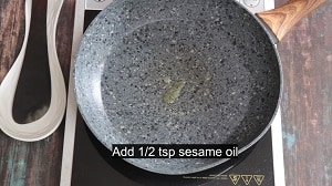Oil added to roast whole red chilies