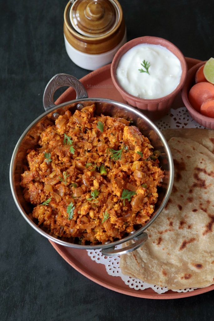 Paneer Bhurji served with plain parathas, pickle and curd