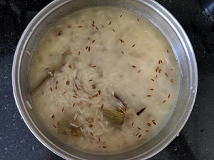 rice to be pressure cooked with spices and cumin