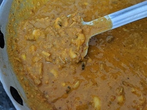 Add tempering and serve Vazhaipoo Kootu