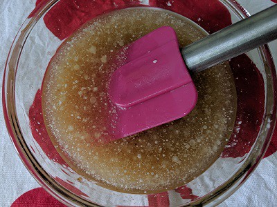 Adding honey and vanilla essence to the mix