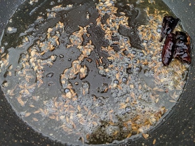 Mustard seeds and cumin seeds tempered in groundnut oil
