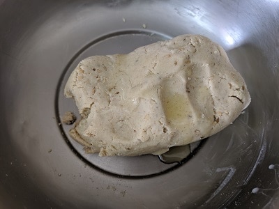 Adding oil to the soft dough