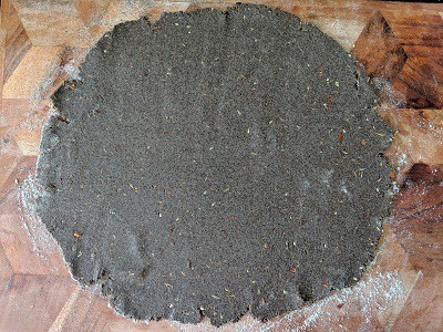 Roll out the dough into a big round shape
