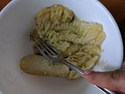 Mashing the over ripe bananas with a fork