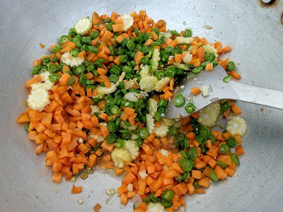 Mixed vegetables added to the onion, garlic, chilli and ginger