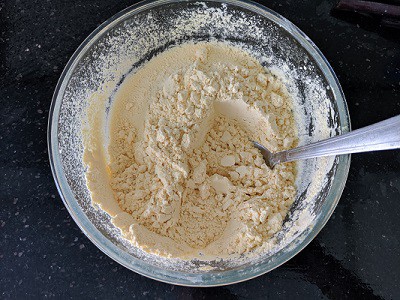 Sift the chickpea flour or besan for a lump free batter