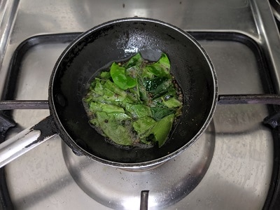 Tempering for the salad - Oil, mustard seeds, curry leaves and hing.