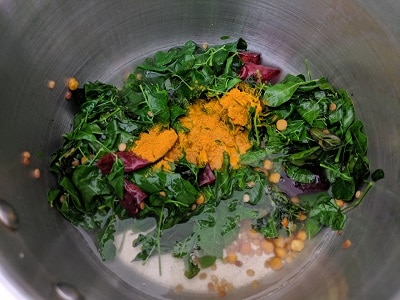 Cook the drumstick leaves with water and turmeric powder