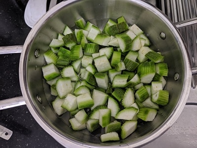 Cooking the Ridge Gourd with water and salt
