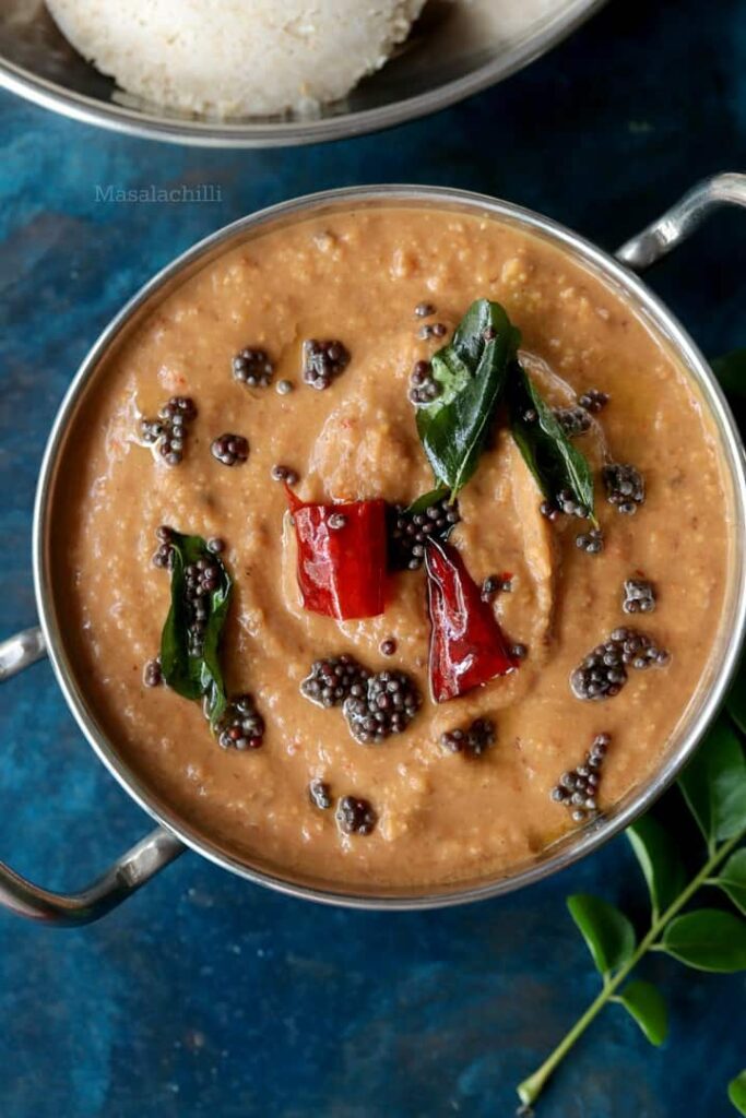 Roasted Eggplant Chutney with a tempering of mustard seeds, curry leaves and dry red chillies