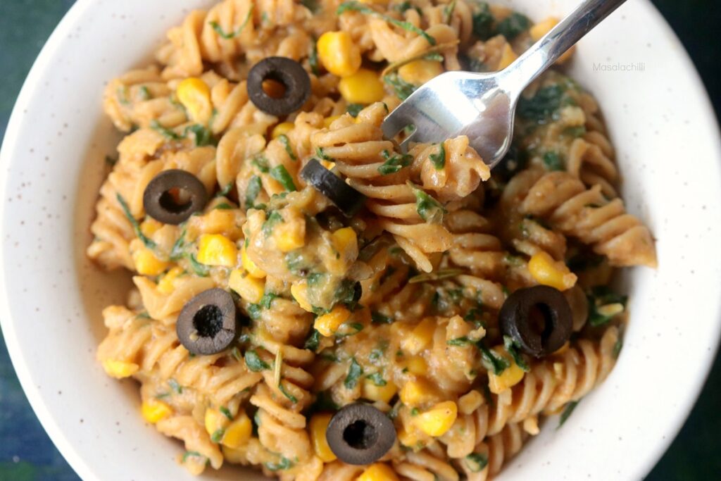 Creamy Pumpkin Sauce Pasta with black olives, spinach and corn