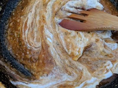 Adding the cashew paste to the pumpkin puree