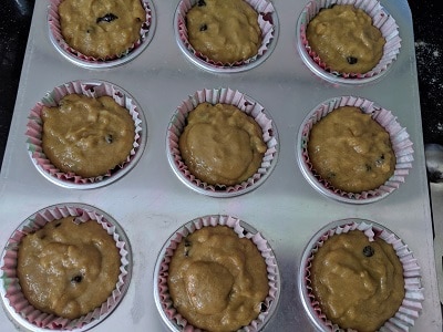 Batter poured into the muffin liners