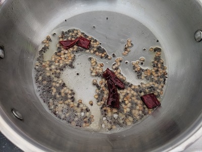 tempering in coconut oil for the pachai payaru sundal