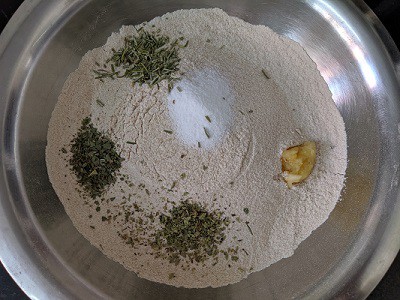 Ingredients for the garlic pull apart bread - flour, garlic paste, salt and herbs