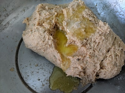 Kneading the dough using butter