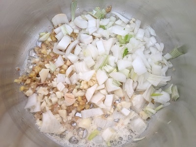Ginger, garlic and onions sauteing in olive oil