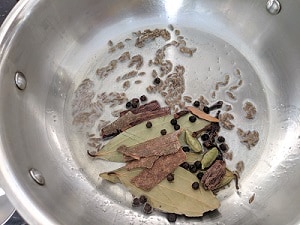 Spices and cumin sauteing in ghee
