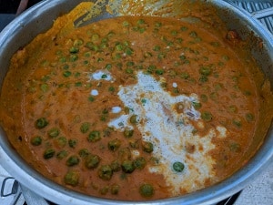 coconut milk added to the curry