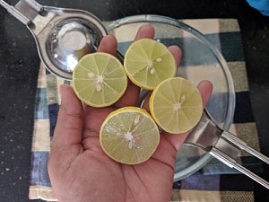 Squeezing fresh lemon juice