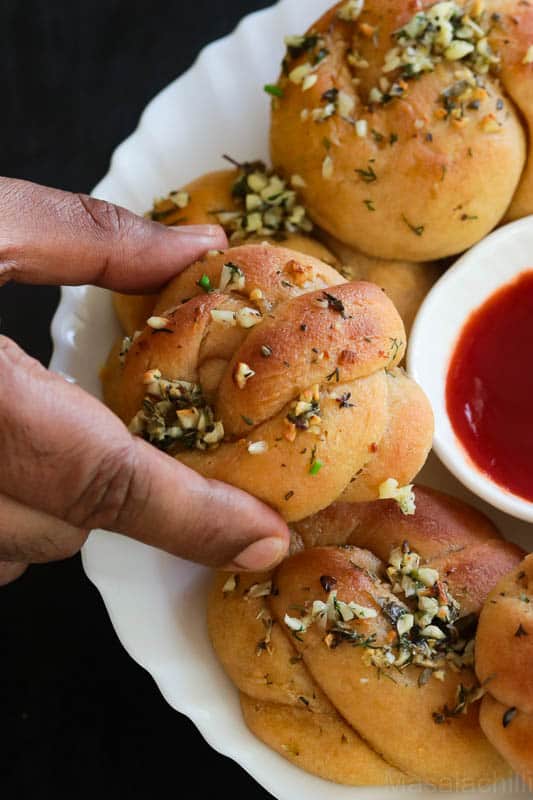Soft Garlic Knots Recipe served with tomato ketchup