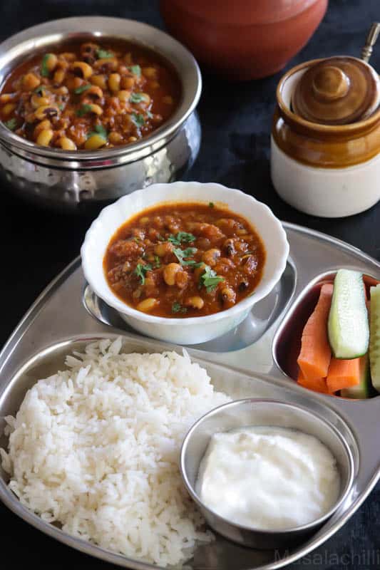 Black Eyed Peas served with Steamed rice, salad and curd