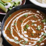 North Indian Style Vegan Dal Makhani made without dairy cream or butter served with rice and salad