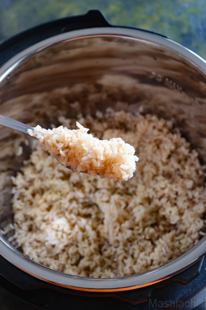 brown rice cooked in instant pot fluffed with a fork