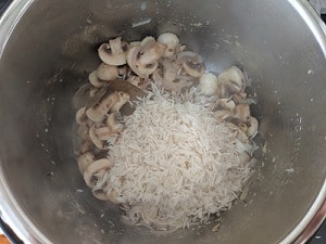 Soaked Basmati Rice added to the mushrooms