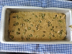 Pumpkin bread batter added to baking tin